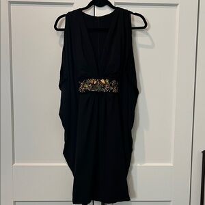 Elegant Black Sleeveless Dress with Embellished Waist